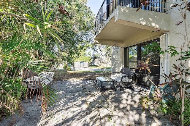 view of patio / terrace with a balcony