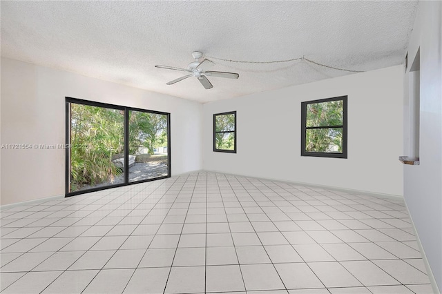 unfurnished room with a textured ceiling and ceiling fan