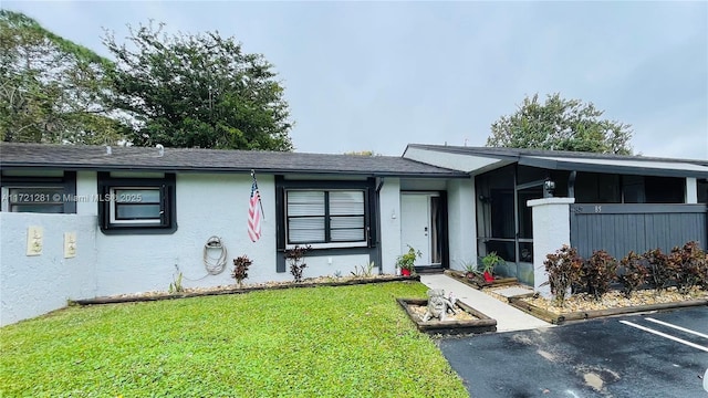 85 Conaskonk Cir Unit 85, Royal Palm Beach, FL 33411 - single story home featuring a front lawn and stucco siding
