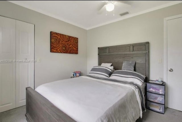 85 Conaskonk Cir Unit 85, Royal Palm Beach, FL 33411 - bedroom featuring a closet, carpet, a ceiling fan, and visible vents