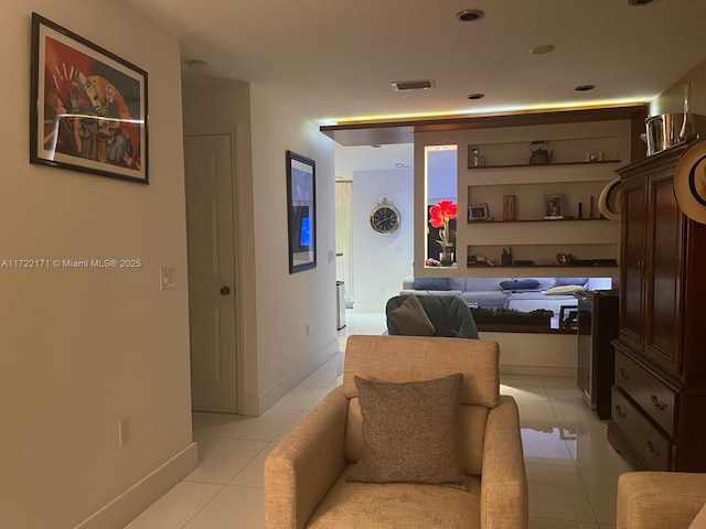 bedroom featuring light tile patterned floors