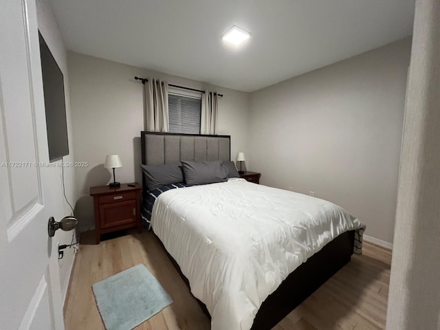 bedroom featuring light hardwood / wood-style floors