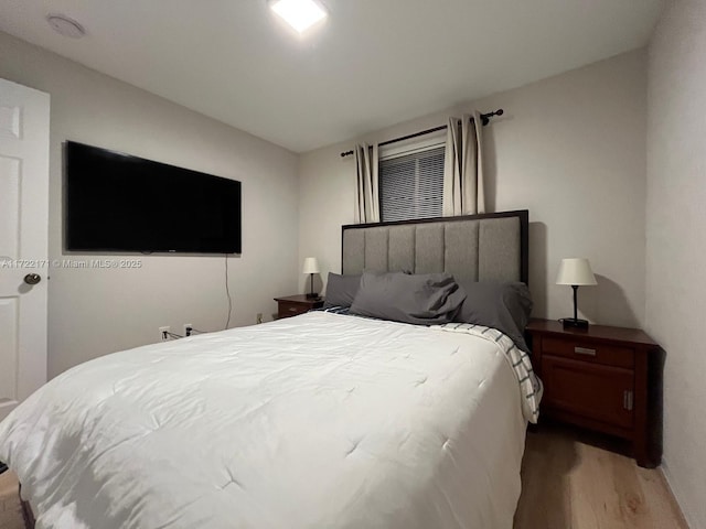 bedroom featuring light hardwood / wood-style flooring