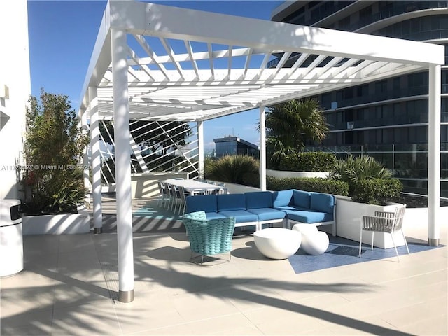 view of patio with an outdoor hangout area and a pergola