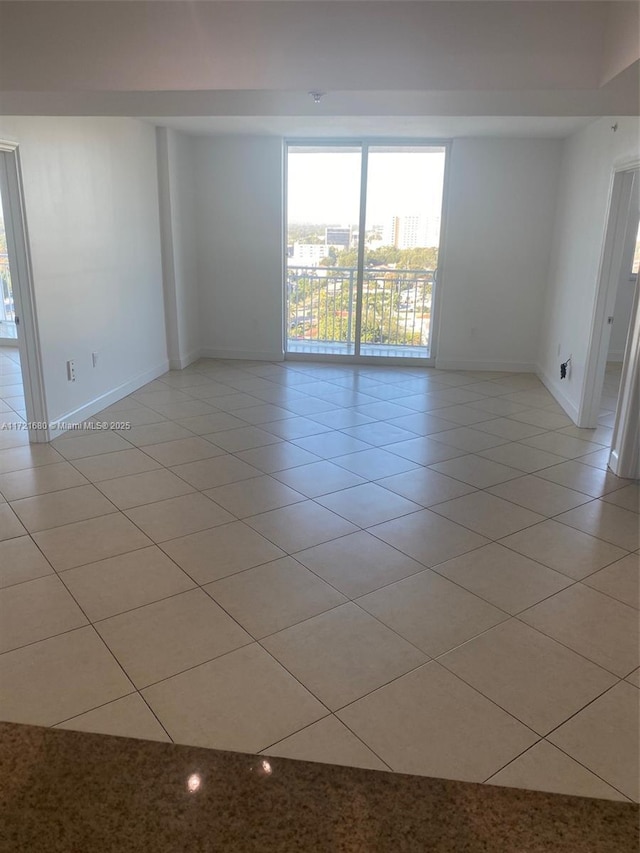 view of tiled spare room