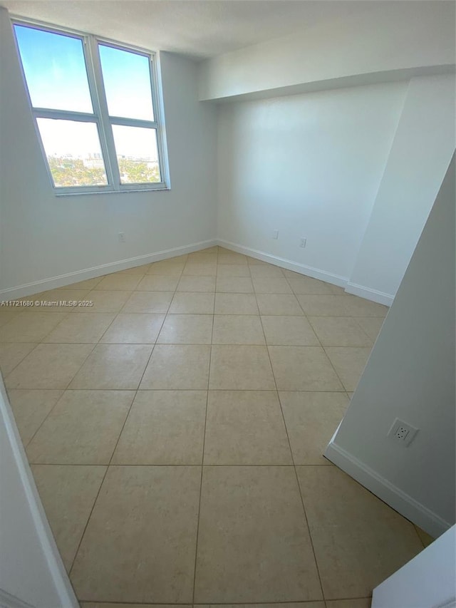 view of tiled spare room