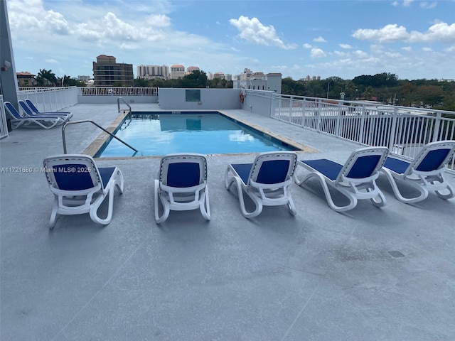 view of pool with a patio