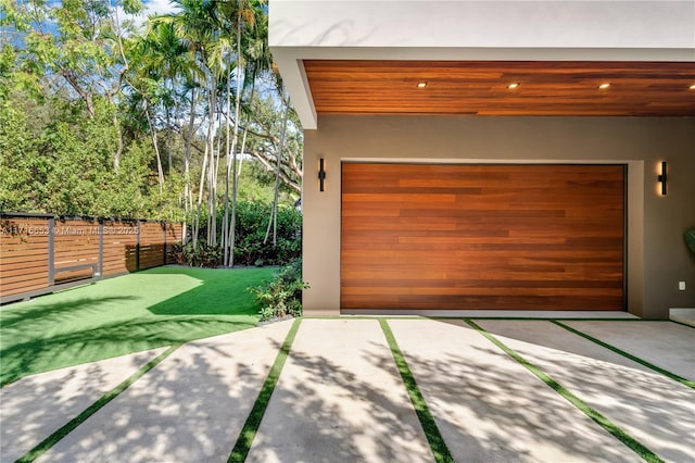 garage with a lawn