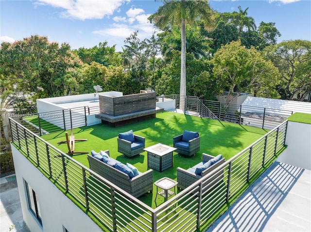 exterior space with fence and outdoor lounge area