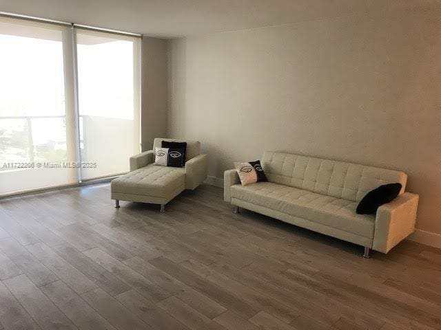 living area featuring dark hardwood / wood-style flooring