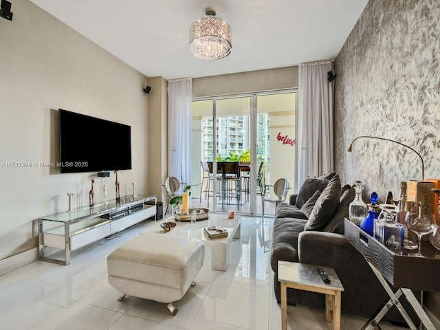 living room with a chandelier and light tile patterned floors