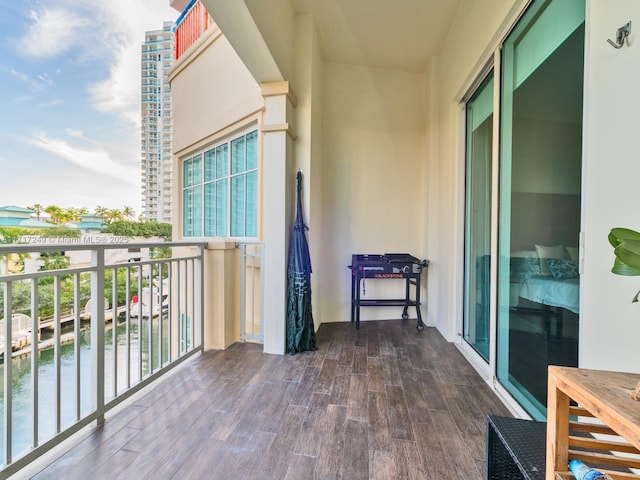 balcony featuring a water view