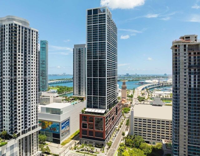 property's view of city featuring a water view