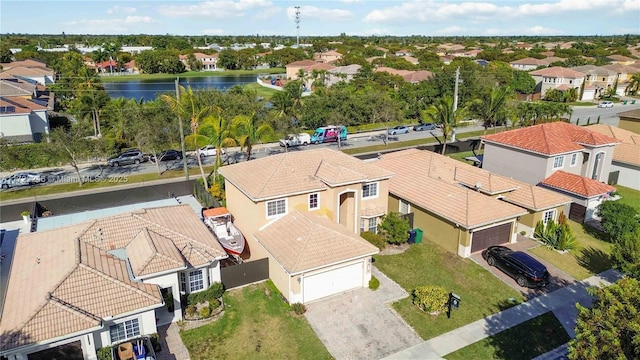 drone / aerial view with a water view