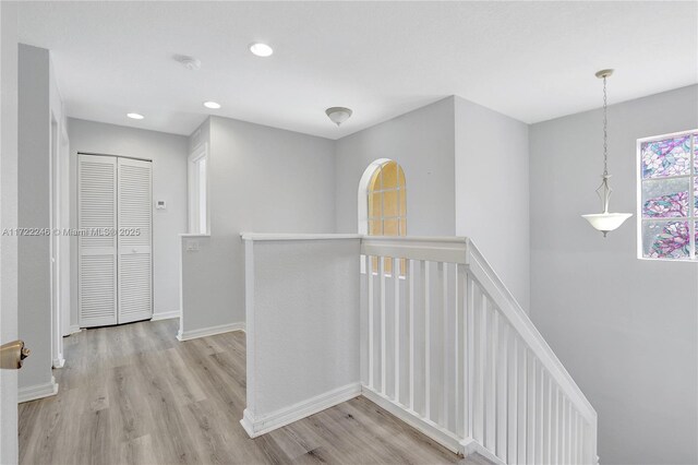 hallway with dark wood-type flooring