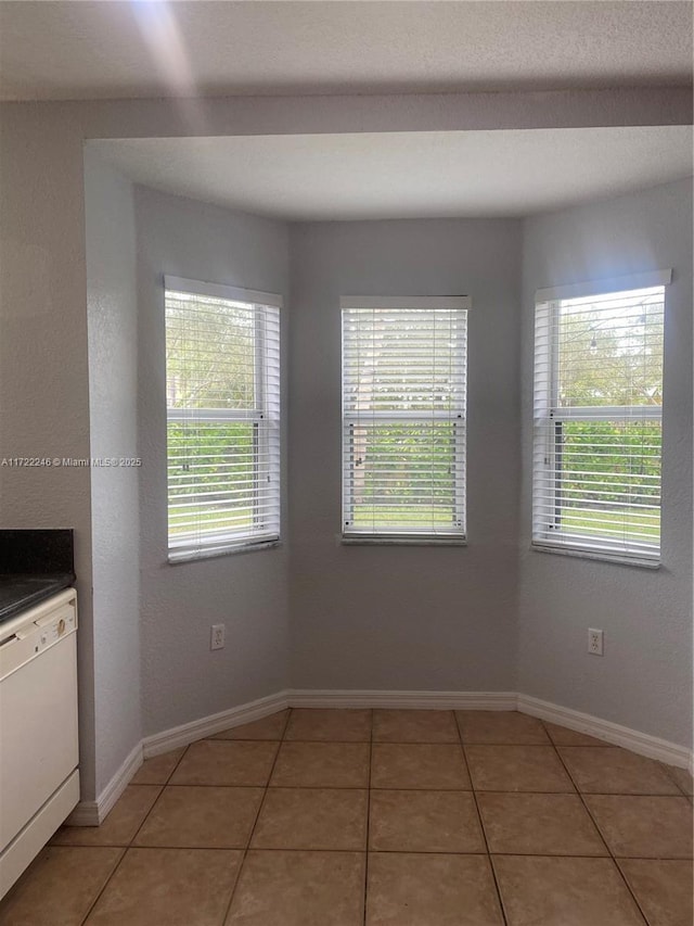 interior space featuring tile patterned flooring