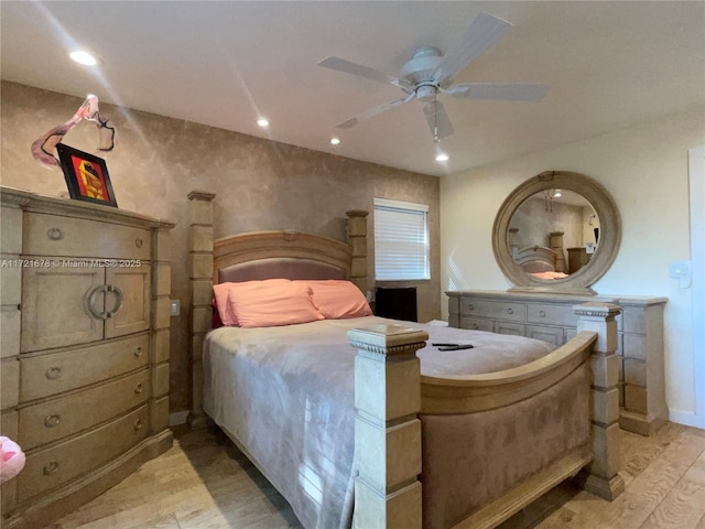 bedroom featuring ceiling fan and light wood-type flooring