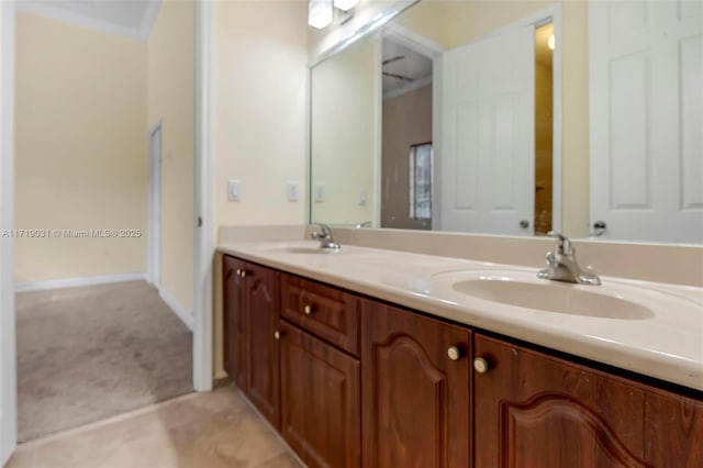 bathroom featuring vanity and ornamental molding