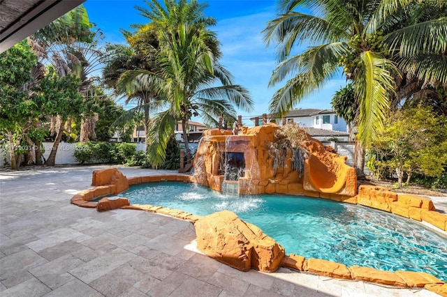 view of pool with pool water feature