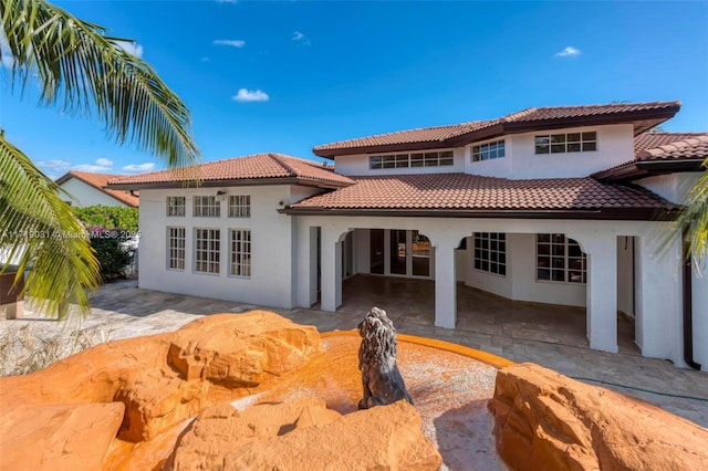 rear view of house with a patio area