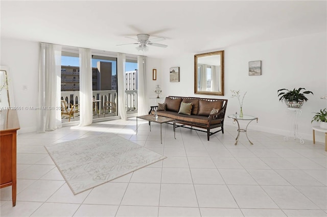 tiled living room featuring ceiling fan