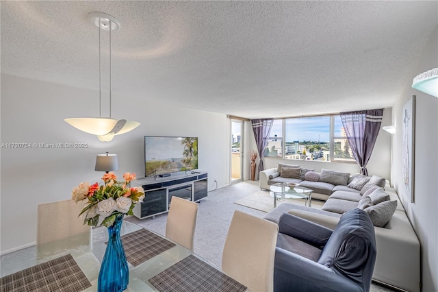 living room with light carpet and a textured ceiling