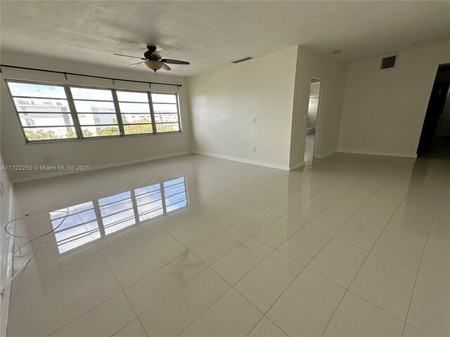 view of tiled spare room