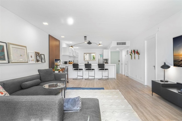 living room featuring light hardwood / wood-style flooring