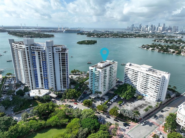 drone / aerial view with a water view