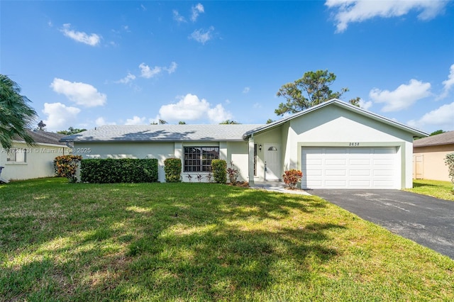 single story home with a front yard and a garage