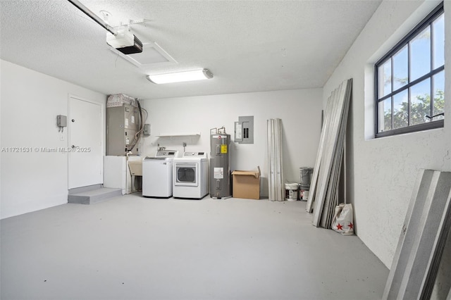 2638 NW 98th Way, Coral Springs, FL 33065 - below grade area with electric panel, electric water heater, washer and dryer, a textured ceiling, and heating unit