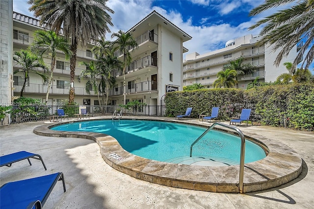 view of pool featuring a patio