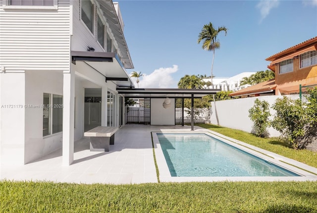 view of swimming pool featuring a patio area