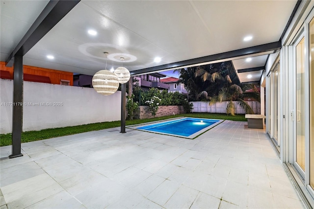 view of swimming pool with a chandelier