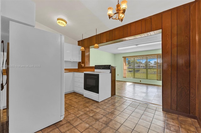 kitchen featuring pendant lighting, white appliances, white cabinetry, and light tile patterned floors