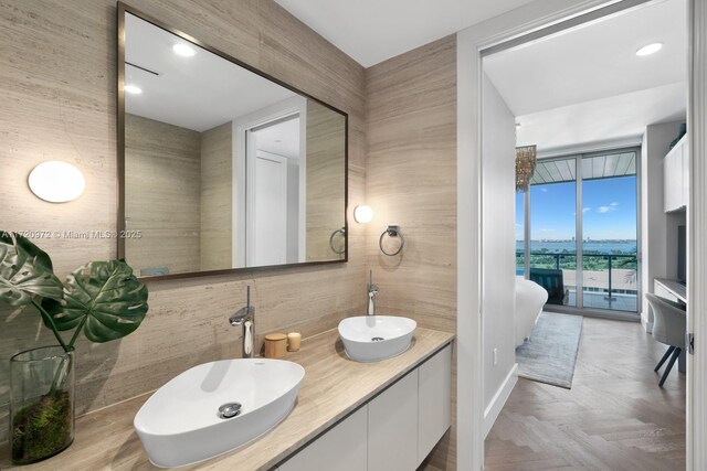 bathroom featuring independent shower and bath and hardwood / wood-style flooring