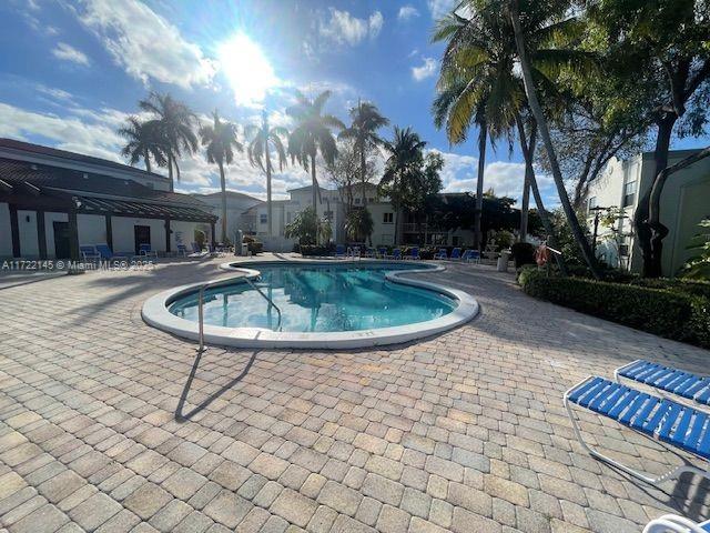 view of pool with a patio area