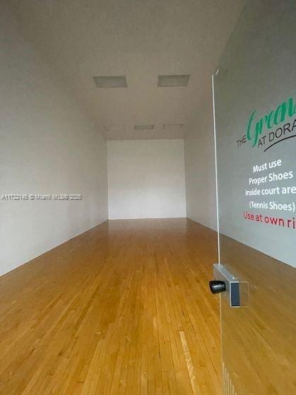 empty room featuring hardwood / wood-style flooring