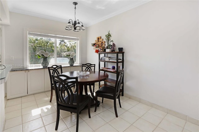 dining area with light tile patterned floors, an inviting chandelier, and crown molding