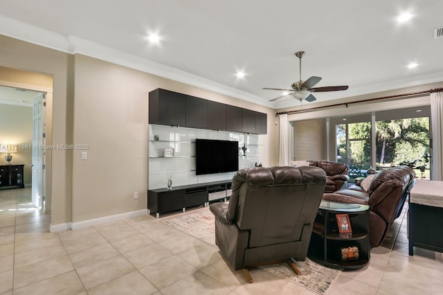 living room featuring ceiling fan, light tile patterned floors, and ornamental molding