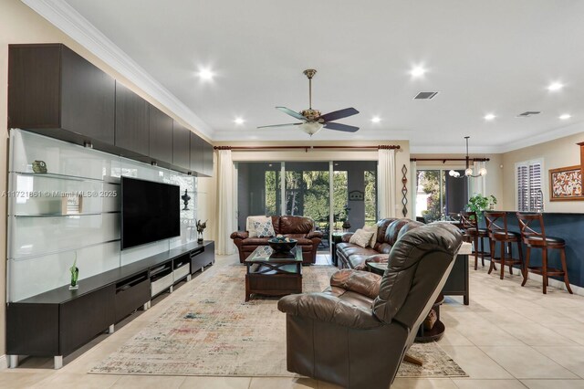 living room with ceiling fan, light tile patterned floors, and crown molding