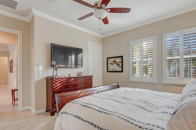 bedroom featuring light tile patterned floors, ceiling fan, and crown molding