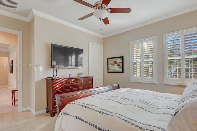 bedroom featuring light tile patterned floors, a ceiling fan, visible vents, baseboards, and ornamental molding