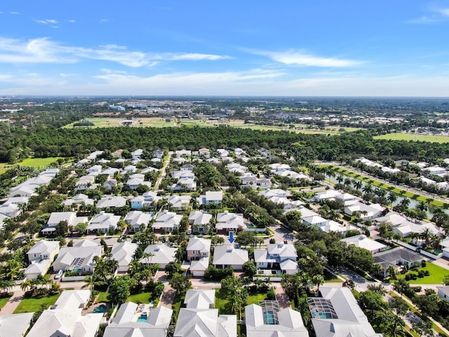 birds eye view of property with a residential view