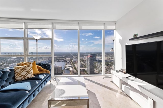 living room with floor to ceiling windows