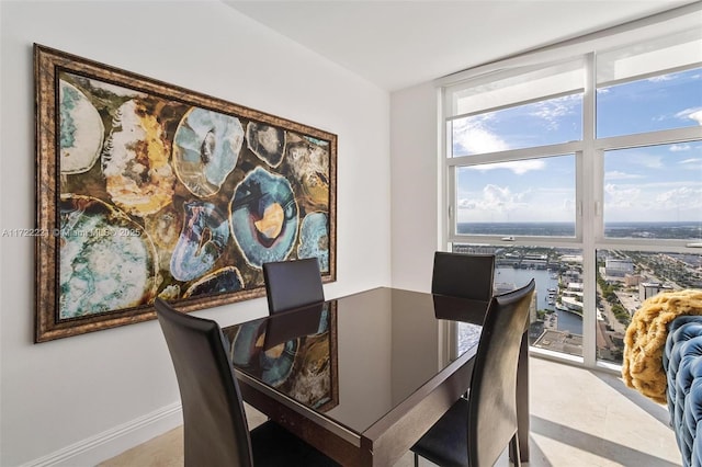 dining area with a wall of windows