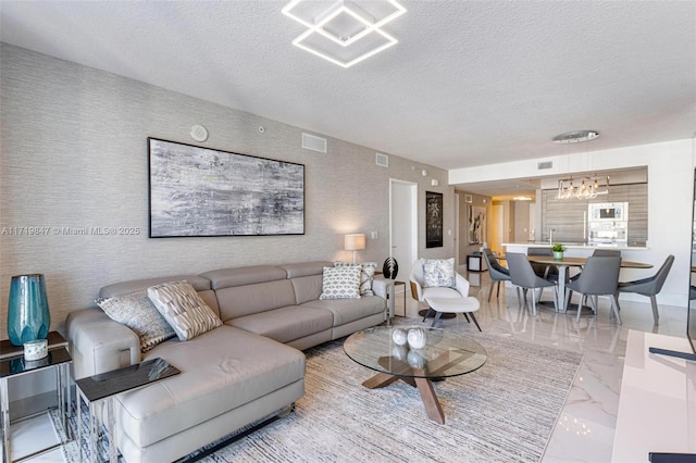 living room featuring a textured ceiling