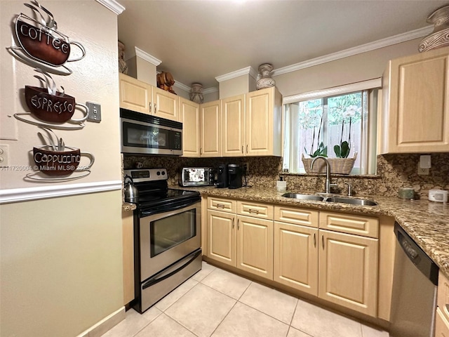 kitchen featuring backsplash, sink, light tile patterned floors, ornamental molding, and stainless steel appliances