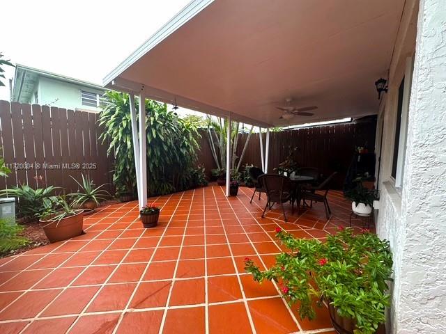 view of patio with ceiling fan