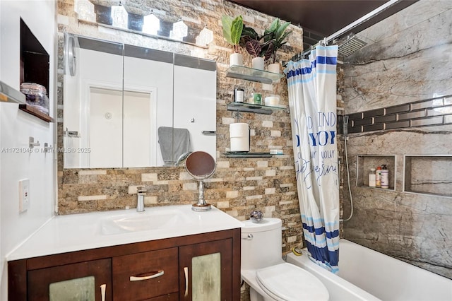 full bathroom featuring shower / bath combination with curtain, toilet, and vanity